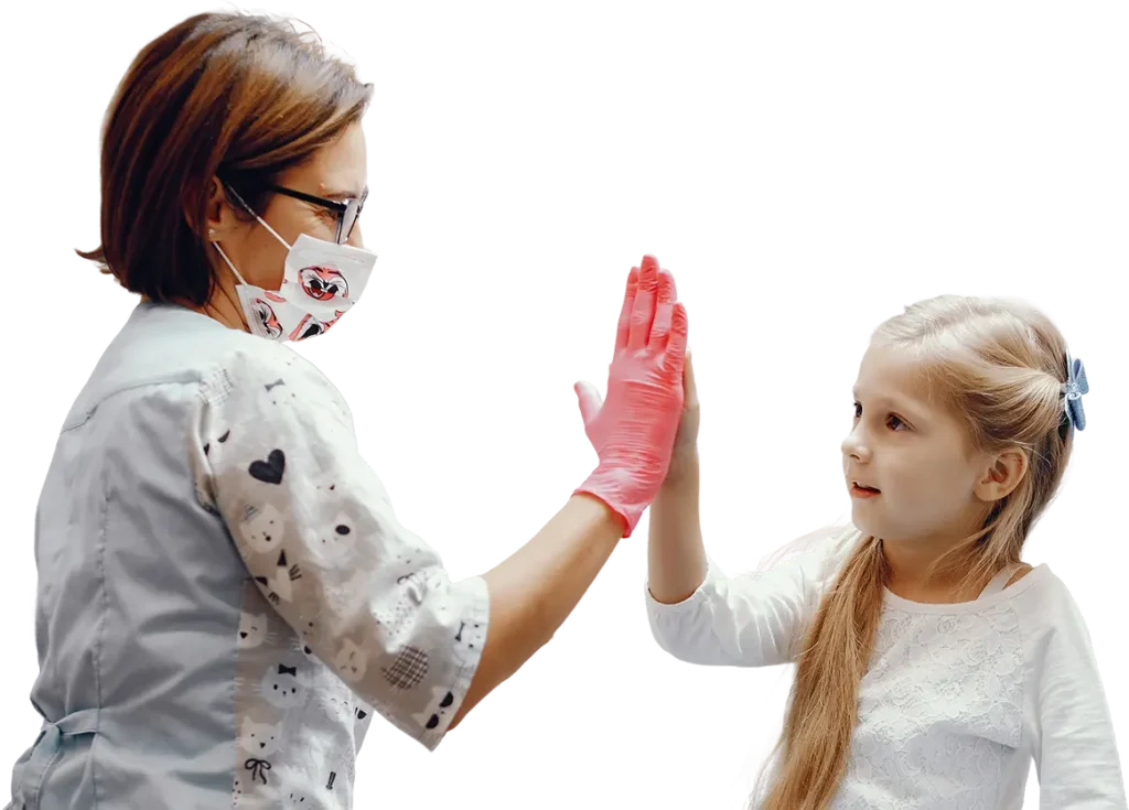 a woman dentist high fiving a kid