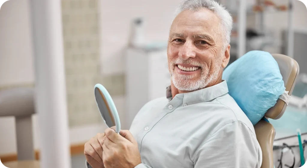 patient smiling to the dentist