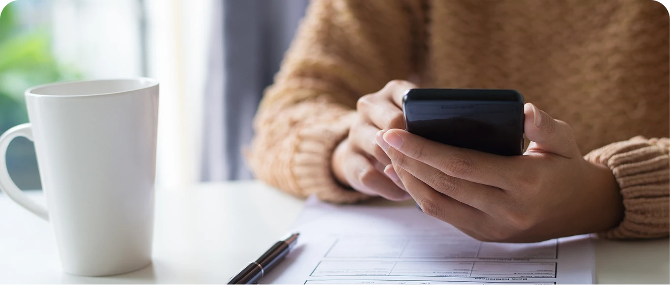 woman holding a phone