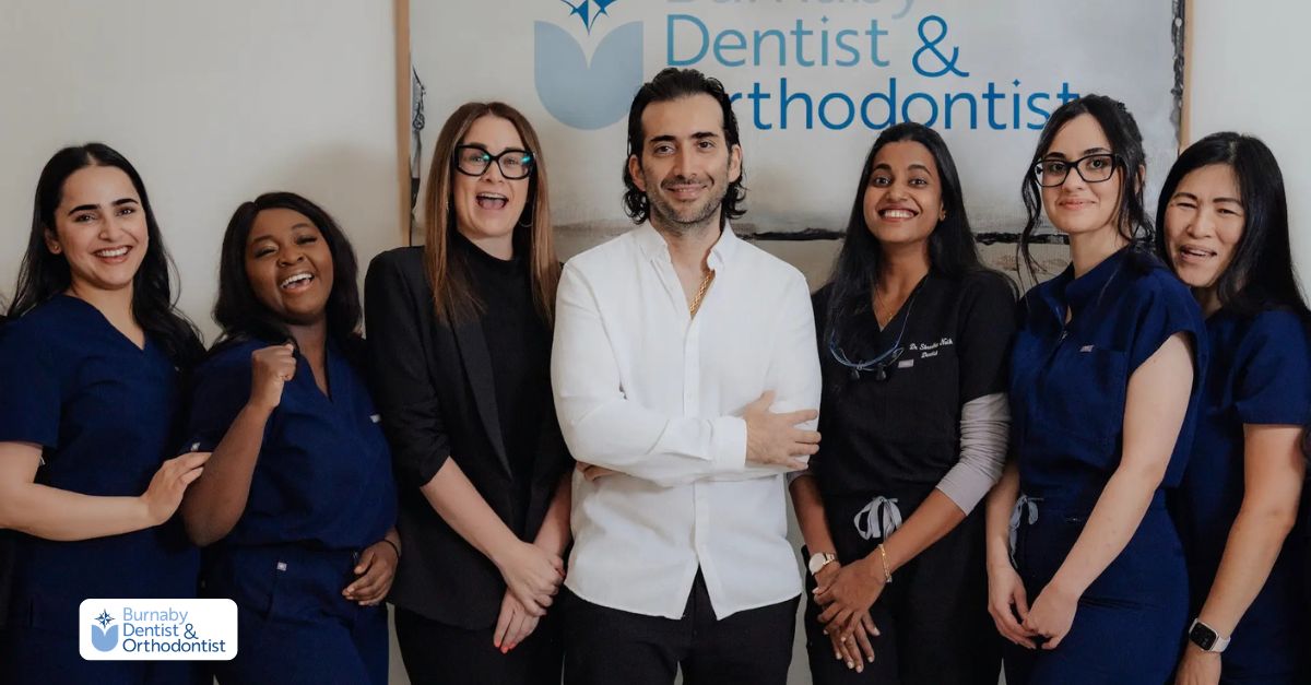 Smiling dental professionals highlighting the benefits of choosing Burnaby Dentist & Orthodontist for dental implants.