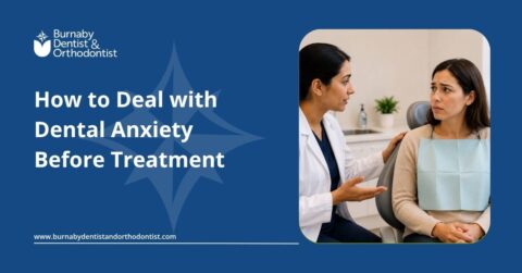 Dentist speaking with an anxious patient in a calm dental clinic