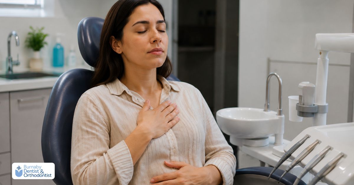 Patient practicing slow breathing techniques to help manage dental anxiety before a dental appointment