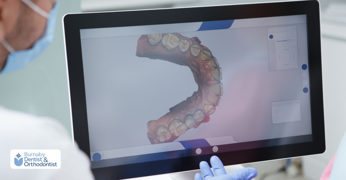 A man presents his teeth on a computer screen, illustrating a digital smile design created by a cosmetic dentist.