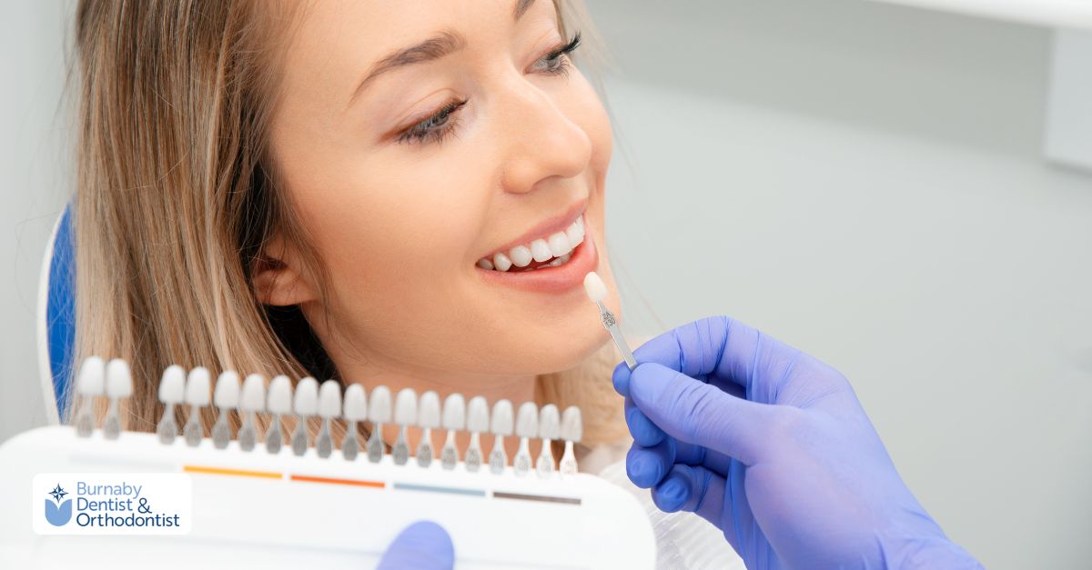A woman receives a dental veneer treatment, highlighting the importance of dental insurance for veneers.